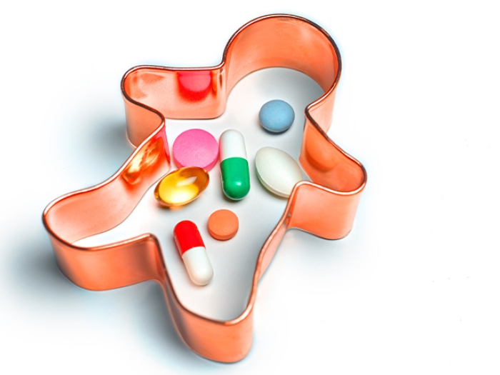 cookie cutter with pills inside in colorful colors