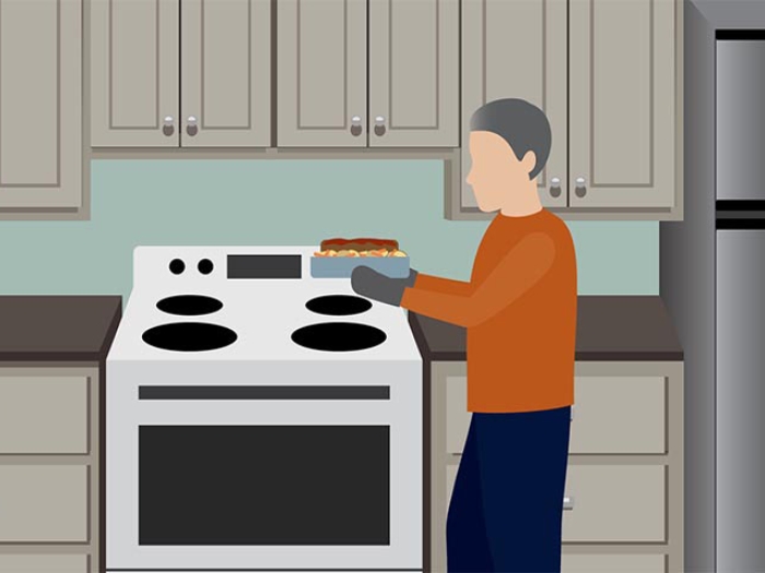Cooking in kitchen