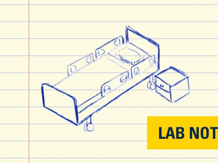 hospital bed in blue ink on lined paper