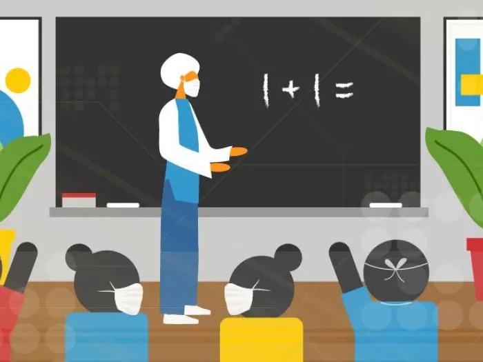teacher in front of black board teaching kids who are raising hands