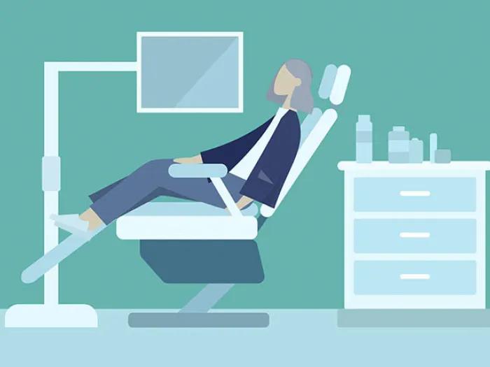 Lady in dental exam chair