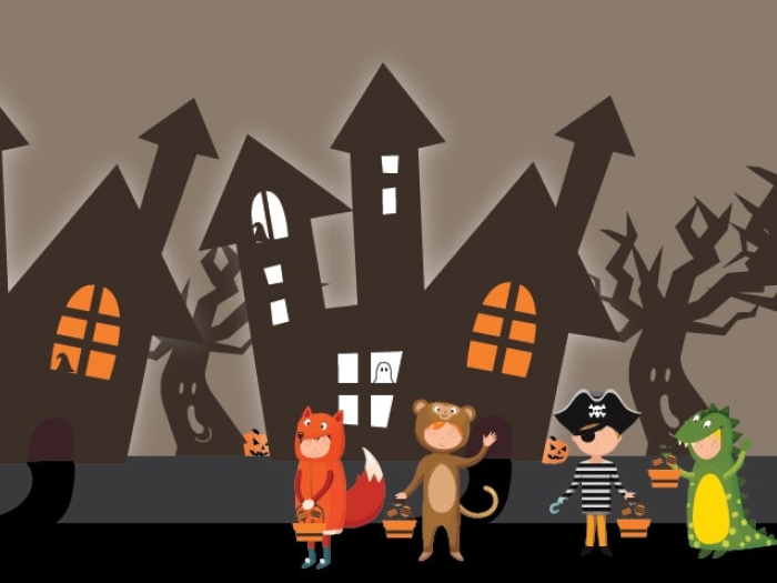 Image of haunted houses and trick or treaters outside