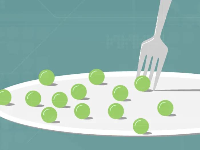 Plate of peas on plate