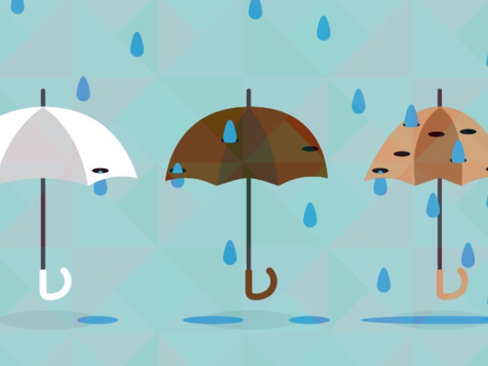 Umbrellas with holes and rain