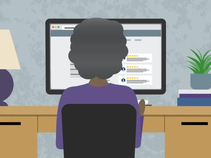 woman on computer in room