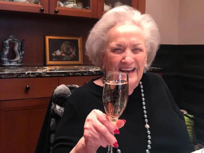 Women cheers with champagne glass