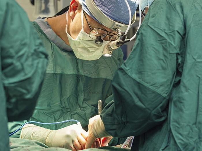 Dr. Yang performing surgery