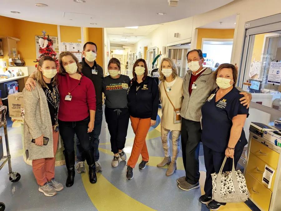 Carrie and Jason Hockstra          Pictured with the U-M nurses who cared for their daughter, Clara