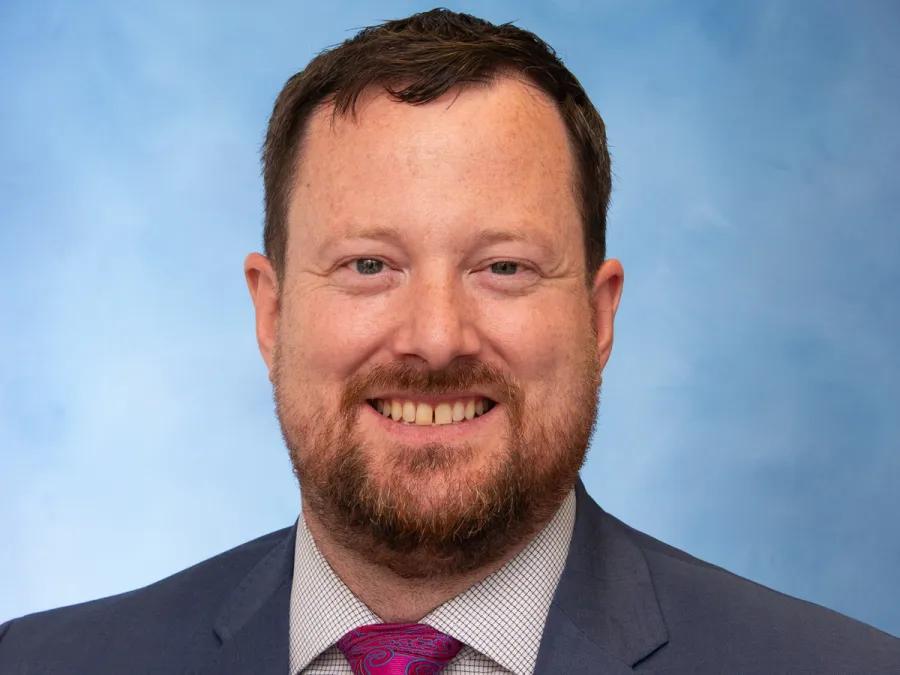 Smiling professional headshot of David Odell, MD.