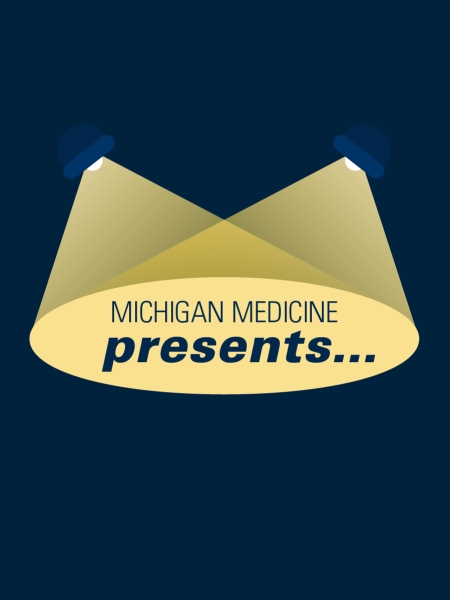 Michigan Medicine Presents in the intersection of two stage lights on a blue background