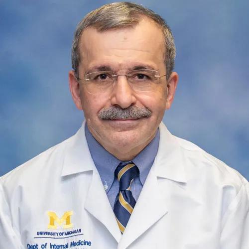 Imad Shureiqi portrait in white coat
