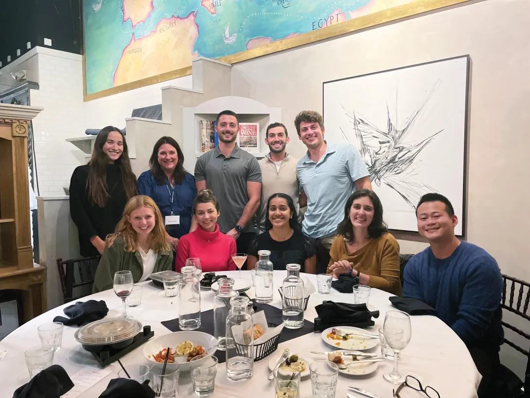 Group picture of med students at a restaurant. 