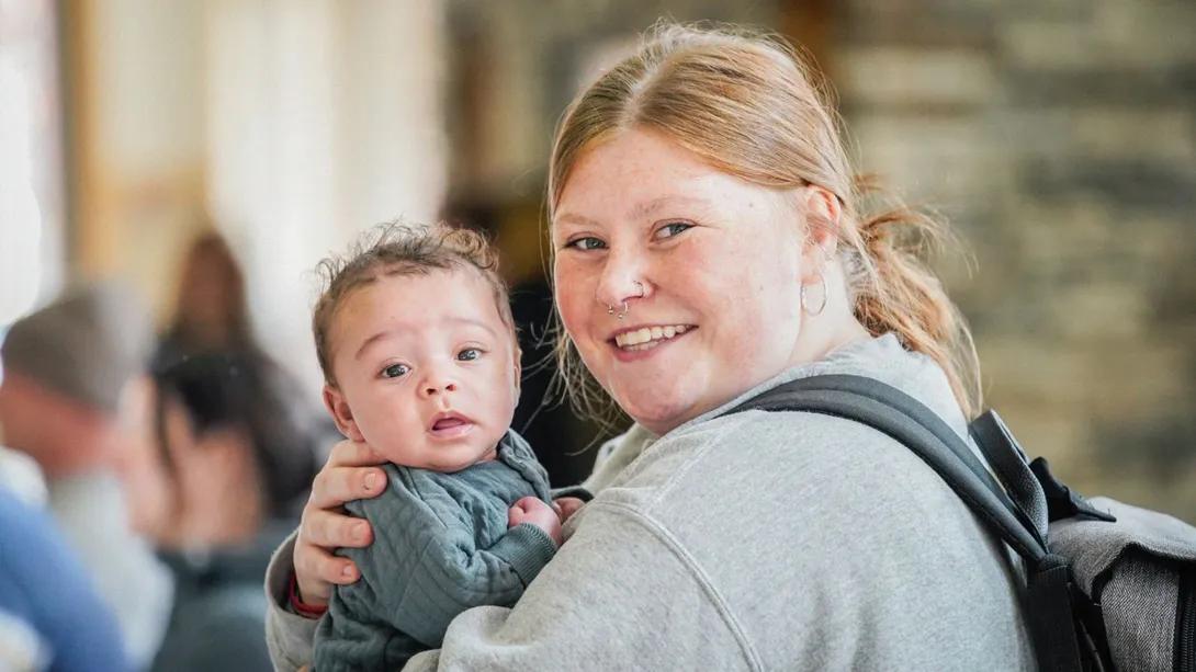 woman holding baby
