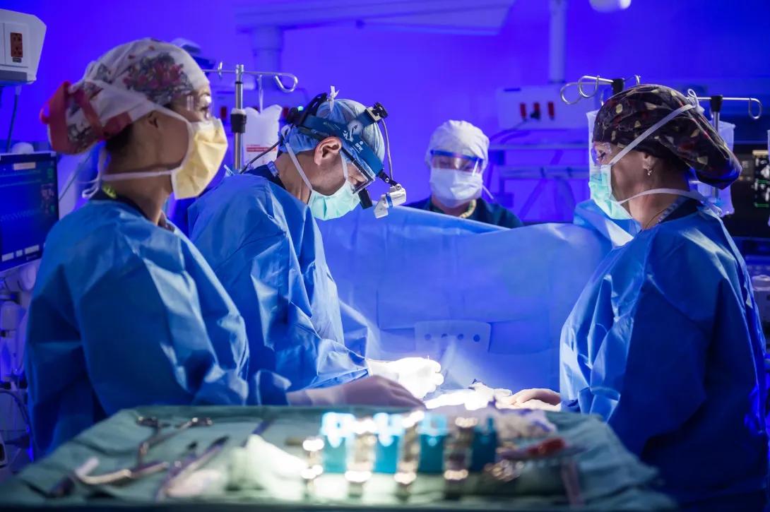 DeLucia III performing cardiac surgery