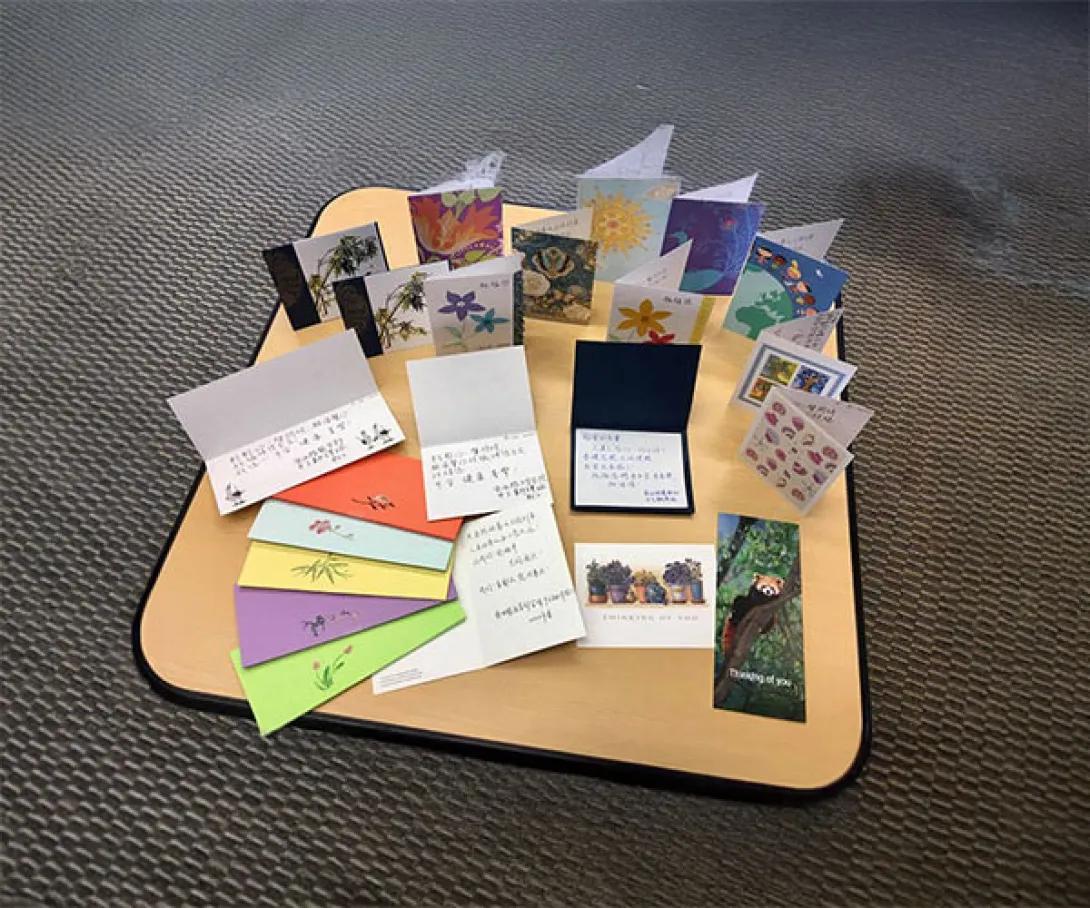 Cards spread across a table.