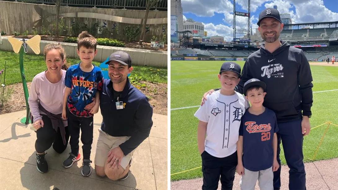 boy smiling with parents and baseball gear on at field 