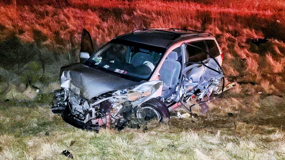 car crash of van in field 