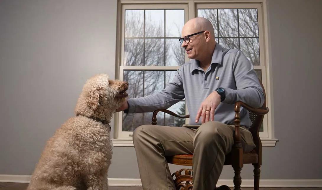 Steve Burns with his golden doodle