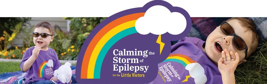 Banner featuring two photos of a smiling child in sunglasses and a purple shirt, with a rainbow, storm cloud, and lightning bolt framing the words “Calming the Storm of Epilepsy for the Little Victors.”