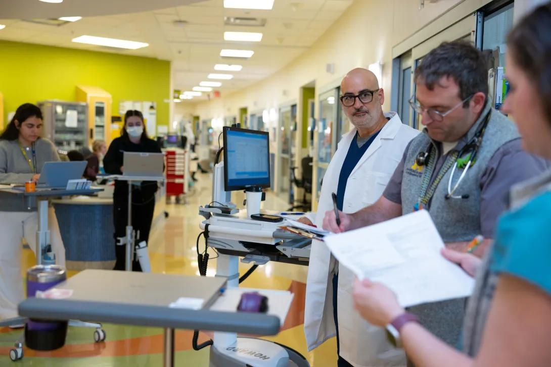 Dr. Mourani and care team round in the pediatric intensive care unit at C.S. Mott Children's Hospital. 