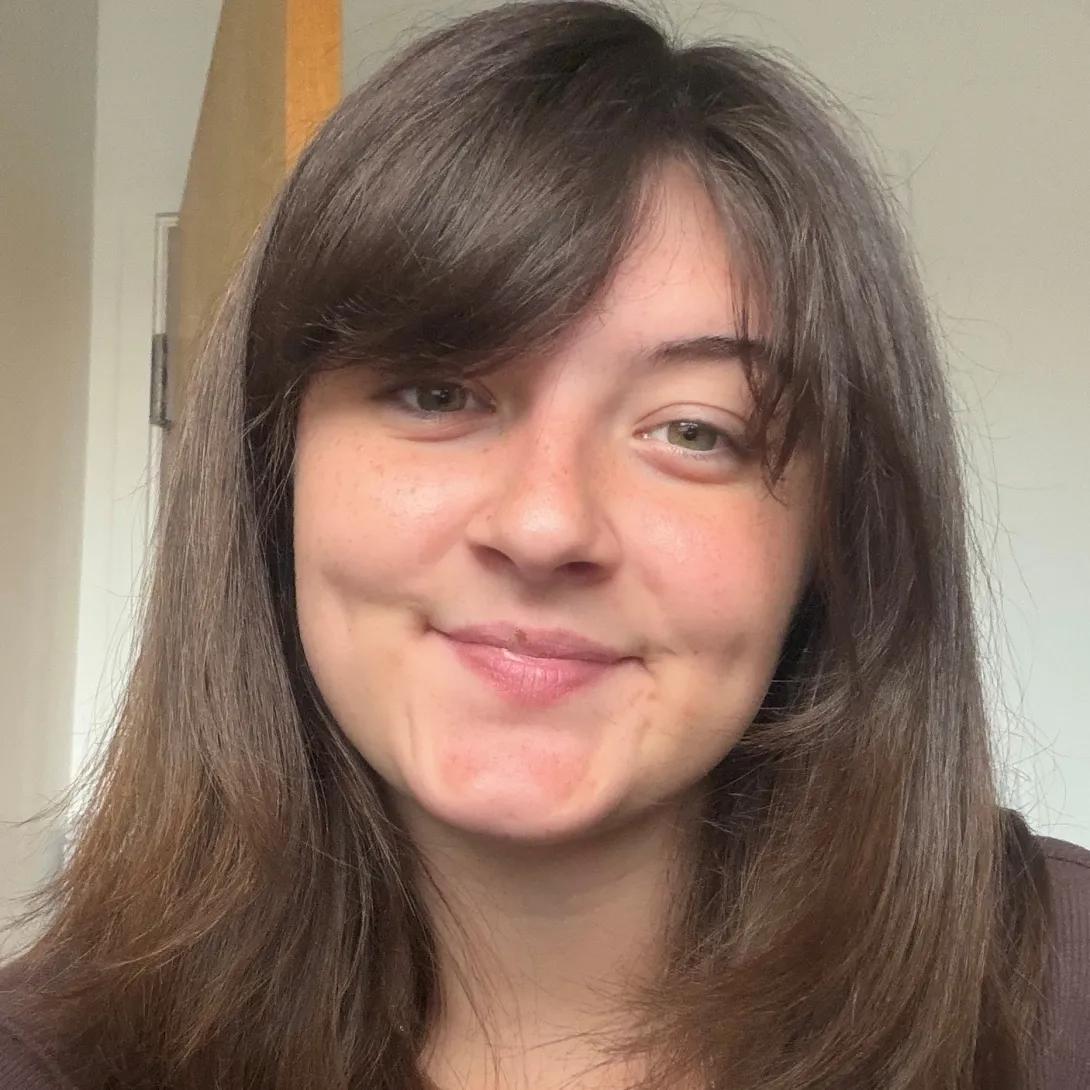 A photo of Tori Kilgore, who describes herself as having dark brown hair, fair skin, and green eyes.
